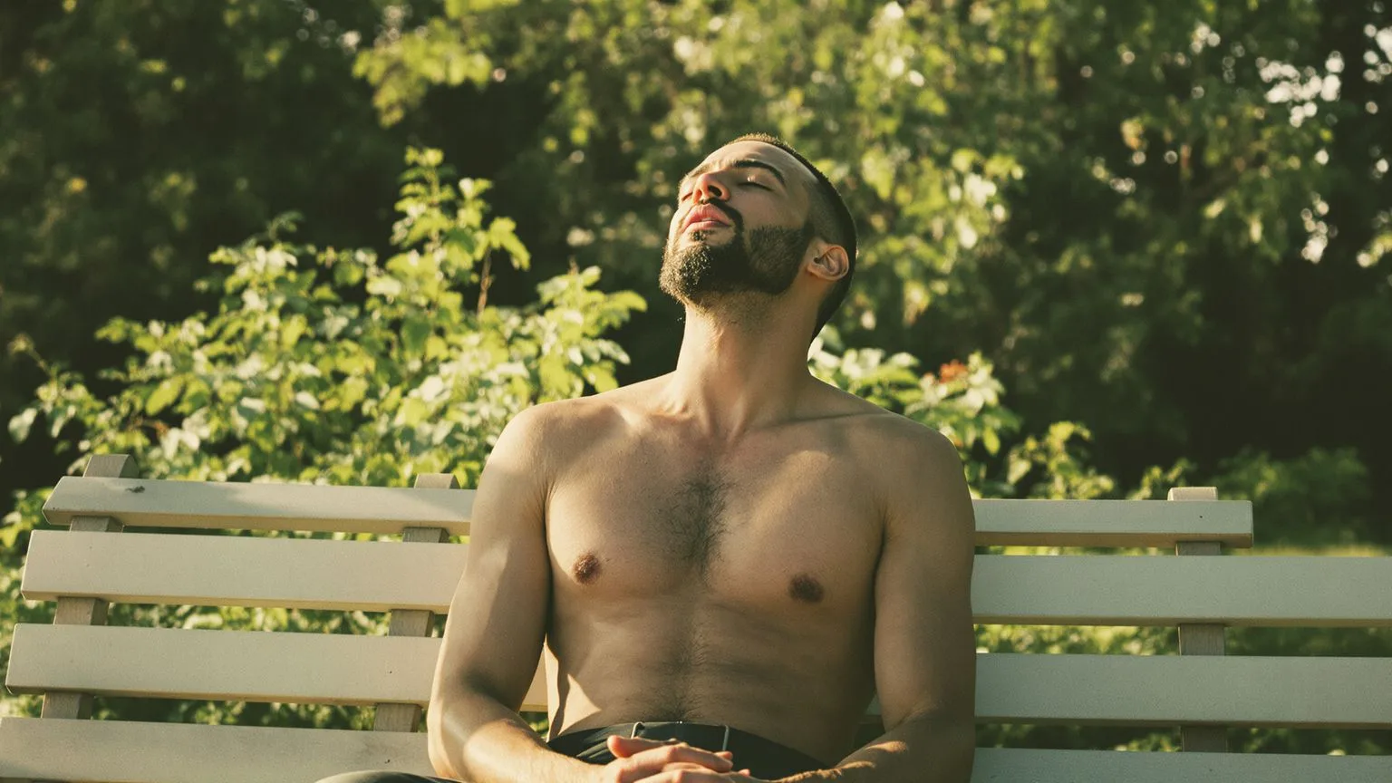 Man breathing deeply on outdoor bench with open chest showing what changes after one honest interruption